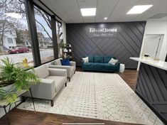 an office lobby with couches and chairs