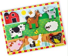 a wooden puzzle with farm animals on it