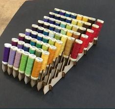 several spools of thread sitting on top of each other