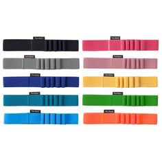 various colors of elastic bands on white background