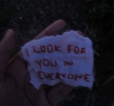 someone holding up a piece of paper with the words look for you in everyone written on it