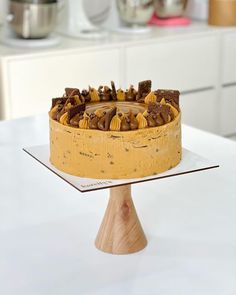 a cake sitting on top of a white table