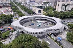 an aerial view of a parking lot in the city