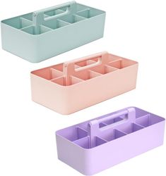 three different colored plastic containers with dividers