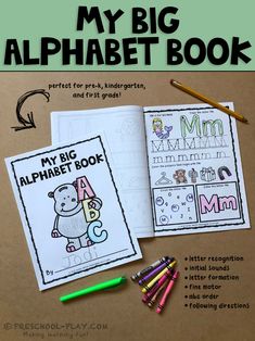 an alphabet book with crayons and markers