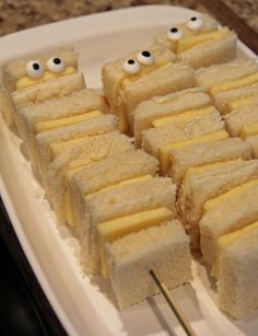 there are many pieces of cake with googly eyes on them