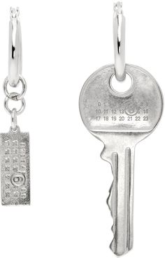 Pair of mismatched drop earrings in silver-tone brass. · Logo-engraved charm and pendant at drop · Hinged-post fastening · H2.75 x W0.75; H2 x W0.75 Supplier color: Polished palladio Fit Board, Key Earrings, Silver Key, Mismatched Earrings, Mm6 Maison Margiela, Tattoo Inspo, Watch Necklace, Jewelry Watches, Mens Jewelry