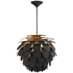 a black and gold chandelier hanging from a chain on an isolated white background