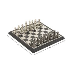 a black and white chess board with silver pieces on it's sides, facing the viewer