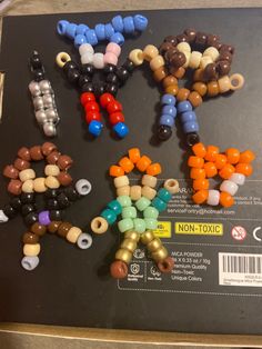 there are many different beads on the table