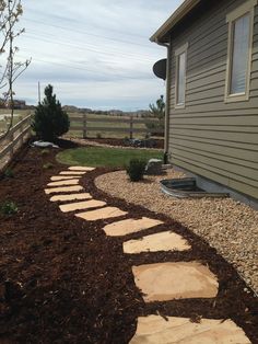 Flagstone steppers Flagstone Stepping Stones Walkways, Stepping Stones In Mulch, Stone And Mulch Walkway, Mulch Pathway Ideas, Flagstone Landscaping, Pretty Pathways, Cedar Farmhouse, Stepping Stone Path, Stone Pathways