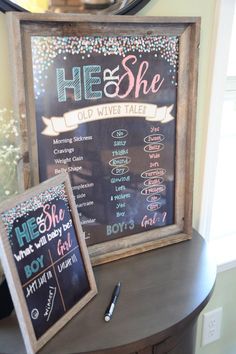 a chalkboard sign that says he and she old wine tales next to a small chalk board with writing on it