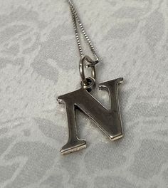 "Very cute! - Sterling Silver 925, Letter \" N\" Charm/ Pendant Necklace  Size-  18\" L  Pendant- 1/2\" x 1/2\" Weight: 3.2  grams  Stamped: 925  Condition :  good condition  Thank you for Visiting!"