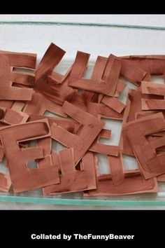 the wooden letters have been cut into smaller pieces