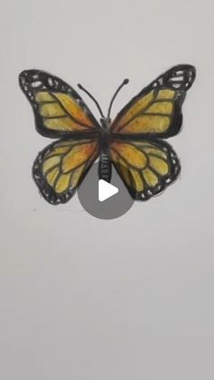 a yellow and black butterfly flying through the air