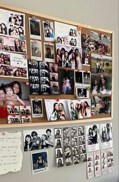 a bulletin board covered in pictures and magnets