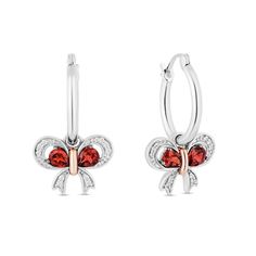 Simply sweet and charming, these red garnet and diamond bow drop earrings from the Enchanted Disney Fine Jewelry Collection inspired by Snow White capture your feminine style. Created in sterling silver Each drop features a sculpted bow sparkling with diamond-lined ribbons. A pair of 4.0 x 3.0mm pear-shaped regal red garnets glistens inside, while a polished knot shines at the center in precious 10K rose gold. These 1/15 ct. t.w. diamond hoop earrings secure with latch backs. ©Disney Enchanted Disney, Enchanted Disney Fine Jewelry, Disney Fine Jewelry, Disney Snow White, Diamond Bows, White Accessories, White Jewelry, Diamond Hoop Earrings, Diamond Drops