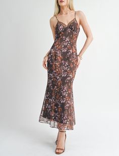 Maxi mesh covered dress with lace detailing. Features adjustable strap and slip underneath. Pair it with: Brown strappy heels + gold accessories -- best dressed wedding guest!