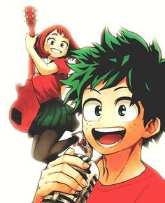 a boy with green hair holding a cell phone and smiling at the camera while another girl looks on