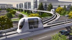 an artist's rendering of a monorail train on the tracks in a city