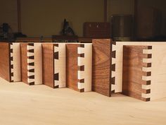 several pieces of wood sitting on top of a table