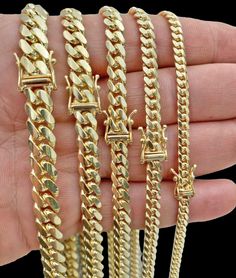 Real Solid 14k Gold Chain Miami Cuban Link Necklace 5mm-9mm 20"-28" Solid 14 k Yellow Gold Miami Cuban Link style Men's chain. The Width of the necklace is 5mm, 6mm, 7mm, 8mm, 9mm (approx.) and Various Length starting From 18 Inches -30 Inches. The Clasp is Box Lock. The chain can be worn without any pendants as it sits flat on the chest and it has its own beauty. If you are not happy with the way it looks we do offer FREE Return shipping. Contact us for more information. The necklace is 100% gu Big Gold Chains, Gold Necklace Chain, Gold Cuban Link Chain, Crystal Bead Jewelry, Cuban Link Necklace, Miami Cuban Link Chain, Miami Cuban Link, 14k Yellow Gold Necklace, Cuban Link Chain Necklaces