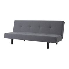 a gray couch sitting on top of a white floor