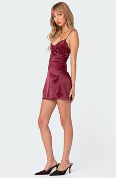 Date night is calling in this satiny mini designed with a lace-trimmed neckline and a strappy open back. Ties at back V-neck Sleeveless 95% polyester, 5% spandex Machine wash, dry flat Imported Dark Red Homecoming Dresses, Unique Hoco Dresses, Red Hoco Dress, Mini Dress Lace, Burgundy Mini Dress, Dark Red Dresses, Bridesmaid Dresses Boho, Red Homecoming Dresses, Prom Dress Inspiration