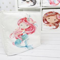 the little mermaids are on display in this set of four canvas storage bins