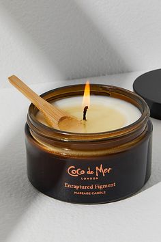 Dissolve into delight with this fresh, aromatic massage candle, infused with fig and orange blossom to stimulate the senses. This candle is perfect for using alone or with your lover. * 200g * Spoon included * Best for all skin types * Fig & orange blossom * Vegan, paraben-free, & glycerin-free * Can be used alone or with your partner **How To Use:** Light and allow to melt as the sensual scent fills the air. Use the serving spoon to drizzle the warm oil over you or your lover to leave the skin Body Oil Candle, Trendy Candles, Massage Oil Candle, Lux Candles, Candles Inspiration, Trendy Candle, Massage Oil Candles, Massage Candles, Fancy Candles