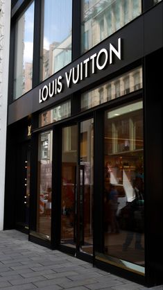 the store front of louis vuitton is shown