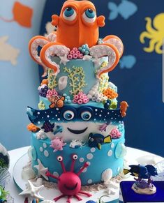 a cake decorated with an octopus and sea creatures