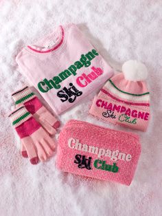 Creatures of comfort, rejoice! Whether you’re layering up to hit the slopes or getting ready to pop a bottle, you will appreciate the snug and soft sweatshirts from Shiraleah. The subtle pink colored "Champagne Ski Club" Sweatshirt is made from a lightweight cotton blend with green and pink stripe details at the hem and matching green, blue, and pink embroidered lettering. Its classic round neck and banded hems make it the perfect casual fit and your ultimate lounge piece. Pair with other items Apres Ski Party Decoration, Ski Club Logo, Colorado Sweatshirt, Mountain Activities, Ski Brands, Spa Wraps, Embroidered Lettering, Creatures Of Comfort, Ski Gifts