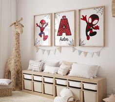 a kid's room with spiderman posters on the wall and toys in bins