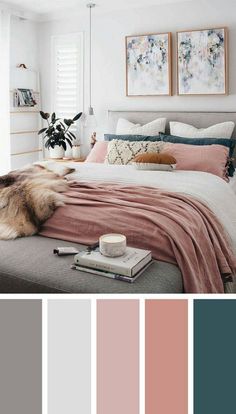 a bedroom with white walls, pink bedding and blue accents in shades of gray