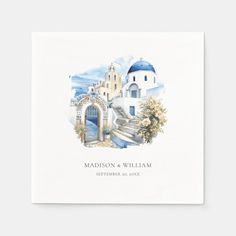 a wedding napkin with an image of a church and blue domes on it, in watercolor