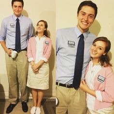 two people standing next to each other in front of a white wall and one person wearing a blue shirt and tie