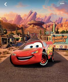 the character cars from disney pixars is driving down the road