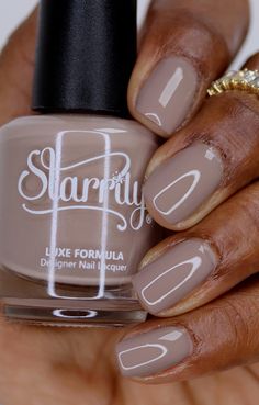 Starrily Lone Wolf Nail Polish: Overview:• Taupe crème nail polish• Best applied in 2-3 coats Description: "Lone Wolf" symbolizes the profound beauty of carving one's unique trail through life, unburdened by the expectations of the pack. The taupe shade echoes the rugged beauty of a wolf's fur, and the quiet strength it exudes while traversing the wilderness alone. This shade is for the individuals who find their greatest strengths when they stand alone, and it embodies the unyielding spirit of those who choose the path less traveled. ★ Certified vegan & cruelty-free nail polish★ Made in the USA. 15 ml / 0.5 fl oz Tip: Always start with a base coat and finish with a clear topcoat. Taupe Nail Colors Shades, Gray Brown Nail Polish, Mauve Marble Nails, Taupe Nail Color, Taupe Nails Designs, Taupe Nail Polish, Taupe Nails, Brown Nail Polish, Cruelty Free Nail Polish