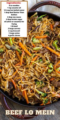 beef lo mein in a skillet with broccoli, carrots and peppers