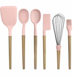 pink kitchen utensils with wooden handles and spoons