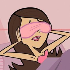 a woman laying in bed with her eyes closed and blind folded over her face as she covers her eyes