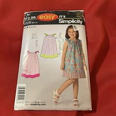 the sewing pattern for girls's dress and slip ons is in excellent condition