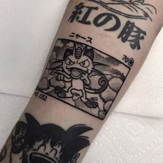 a person with a tattoo on their arm that has an image of a cartoon character