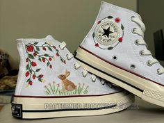 Hand-embroidered Converse shoes are all products that are carefully designed and stitched by artisans, shape your style, and give you unique beauty, bringing confidence and catching everyone's eye. Wearing hand-embroidered Converse shoes with a personal touch offers many benefits. Here are some of the key advantages: 👉Unique Style: Each pair of hand-embroidered Converse shoes is one-of-a-kind. Because they are crafted with care, no two pairs are exactly the same. This helps you stand out and sh Embroidered White Converse, Witchy Closet, Embroidered Converse High Tops, Embroidered Converse, Strawberry Flower, Embroidered Shoes, White Converse, Sneakers Athletic, Womens Wedding Shoes