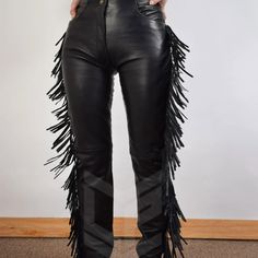 igh Waist Leather Fringe Pant, Western Pants, Leather Pants, Black Leather Pants, Women Fringe Pants, Festival Pants, Yoga Pants, Handmade The reassuring thickness and weight of these beauties just kind of makes you want to swagger and strut. Talk about fringe benefits Get your boogie on in these beautiful black fringe pants. Fringe Pants are made for movement, so feel free to wear them to dance ,High Waist, Pants, Yoga, Casual, Stretch, Comfort, Pant, Legging, Fringe, Boho, Hippie, Festival, Fl Leather Cowgirl Pants, Fitted Rocker Style Black Bottoms, Rocker Style Black Pants For Fall, Black Rocker Pants For Fall, Black Rocker Style Pants For Fall, Fitted Rocker Bottoms With Belt Loops, Black Fitted Rocker Pants, Black High Waist Biker Bottoms, High Waist Black Biker Bottoms