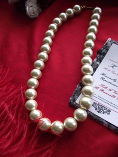 The single strand pearl necklace is so prevalent throughout time that it should be your mainstay in your reenacting, living history, or everyday life! I have several necklaces available and I can add a pearl drop to them if wanted. These are 12mm and 14mm beads with brass slide clasps. If more photos are needed, just ask! The drop down menu shows the size, type. If you aren't sure, just ask! Need earrings? These match perfectly: https://www.etsy.com/listing/262201278/e-0545-vintage-pearl-cluster Pocket Watch Chain, Pearl Cluster, Vintage Pearl, Necklace Pearl, Garnet Earrings, Watch Chain, Living History, Vintage Pearls, Gorgeous Earrings