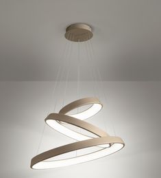 a modern chandelier hanging from the ceiling