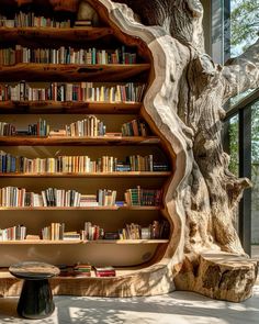 the bookshelf is made out of tree trunks