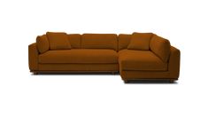 an orange sectional sofa with pillows on the top and bottom, sitting in front of a white background